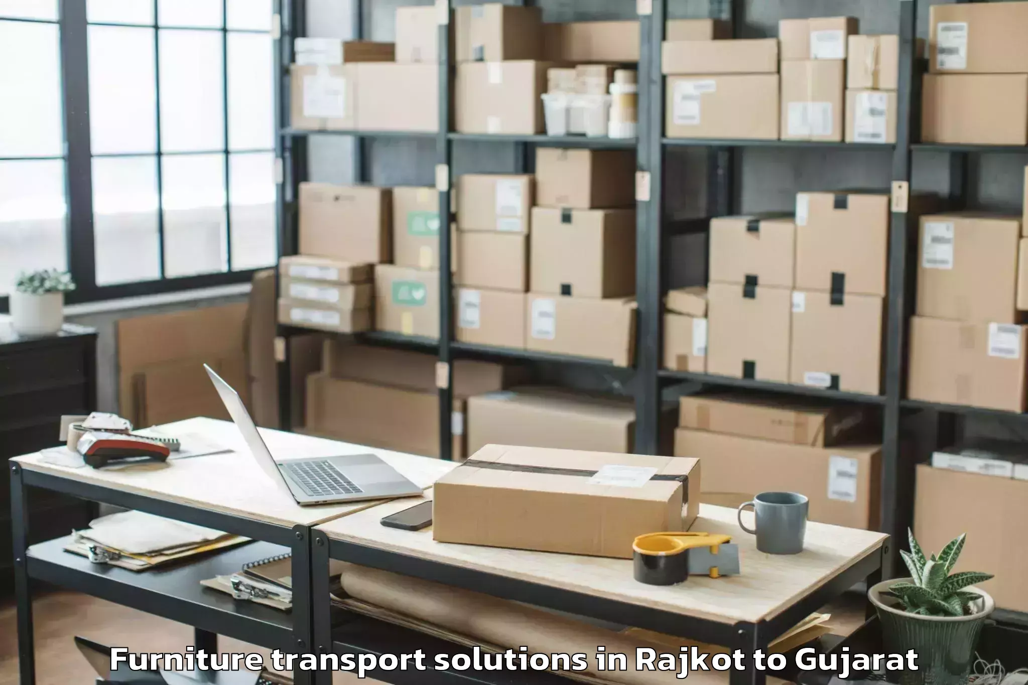 Get Rajkot to Gussar Furniture Transport Solutions